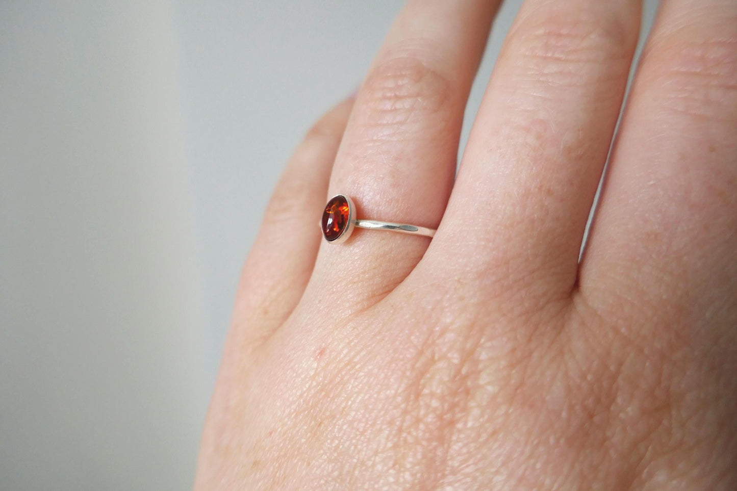 dainty amber ring in silver