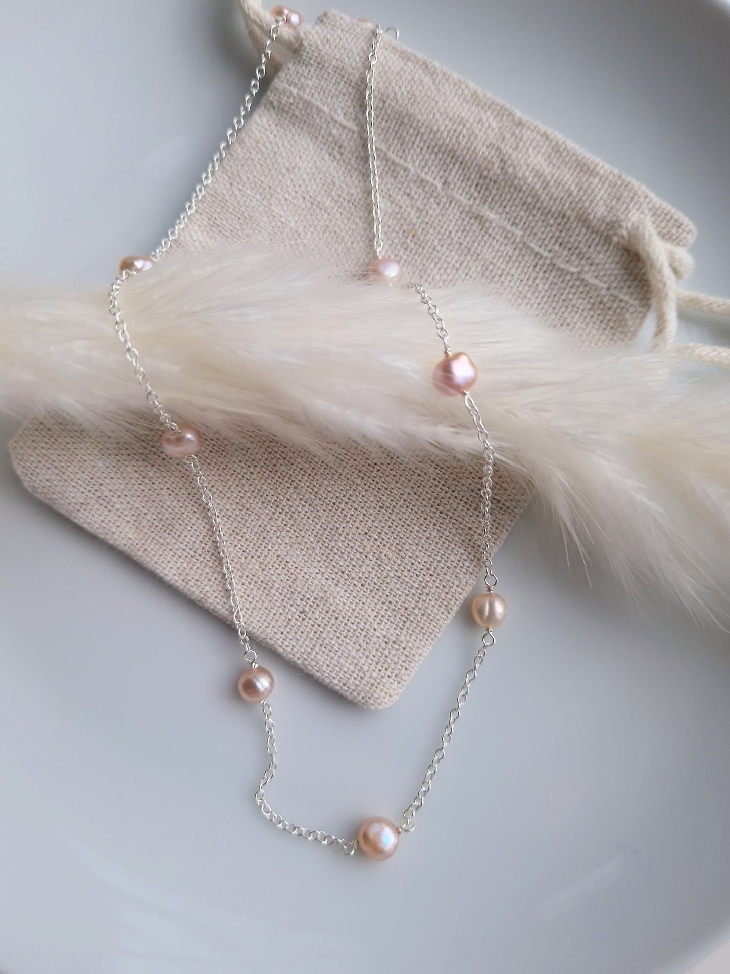 delicate pearl and silver necklace