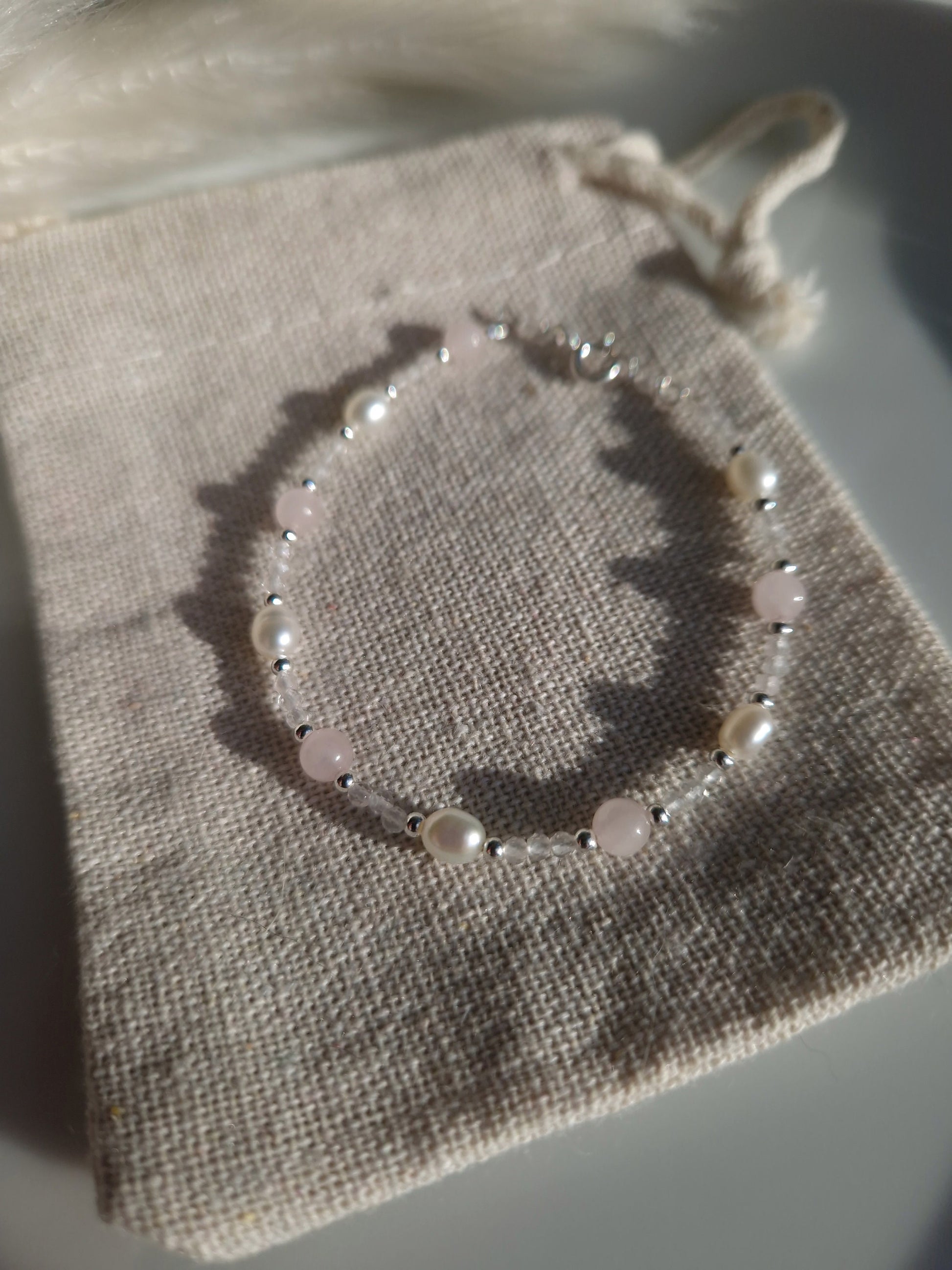 healing crystal bracelet with small beads with rose quartz and pearl