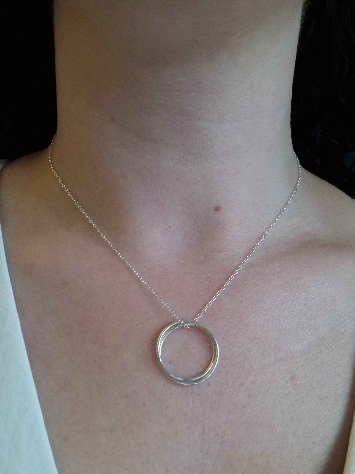 silver hammered circle ring necklace