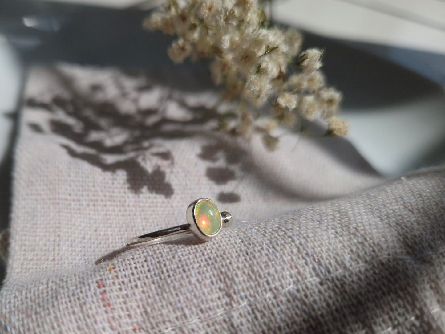 Dainty fire opal and silver ring UK