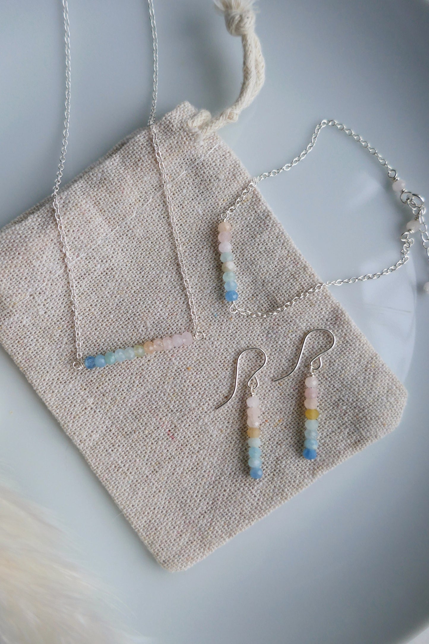 Matching necklace and earring set with morganite gemstones and sterling silver