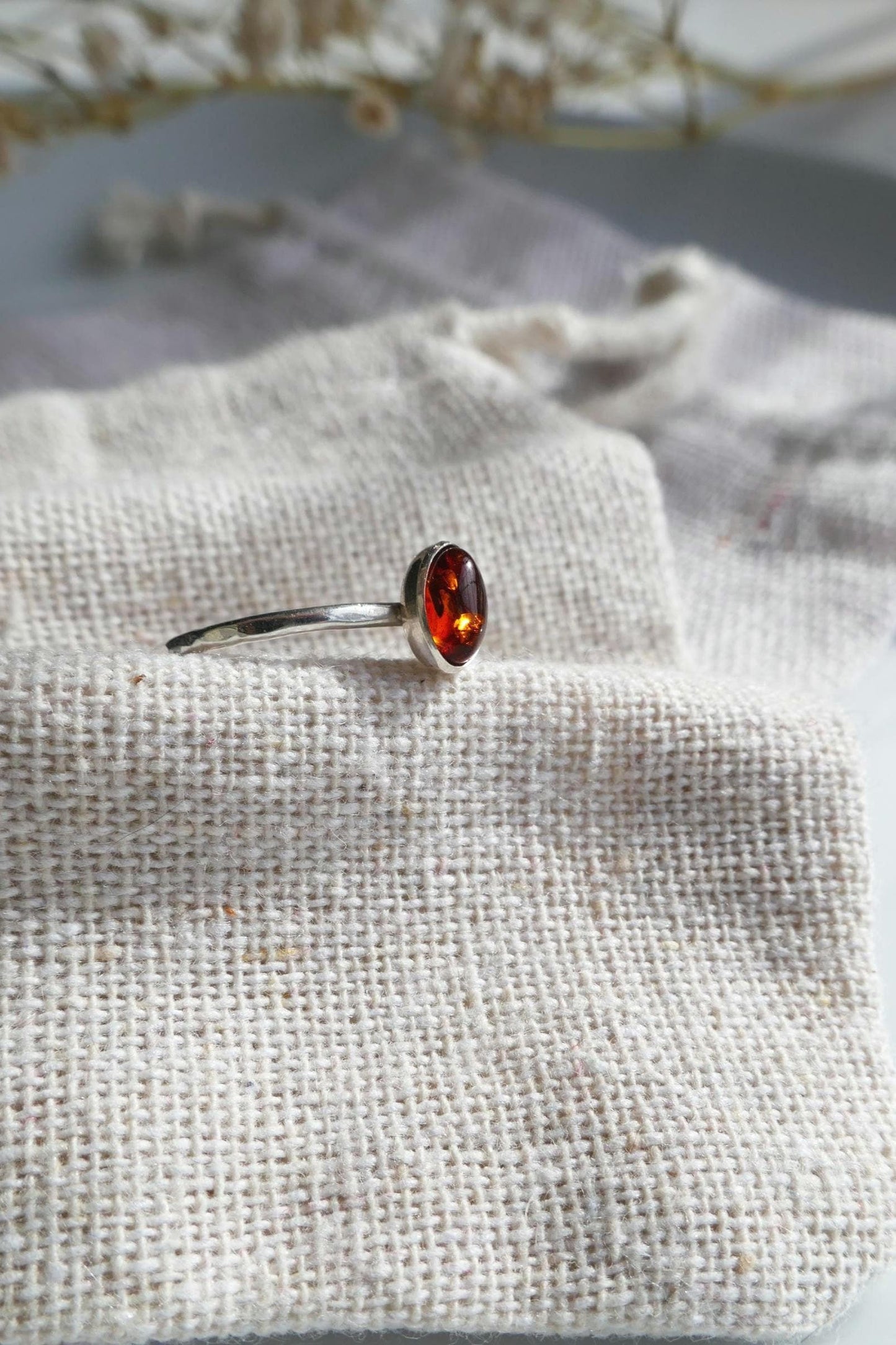 skinny oval amber ring